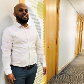 man standing in passage