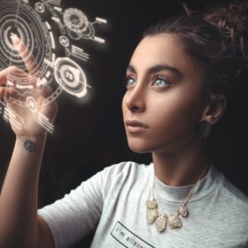 girl touching digital button